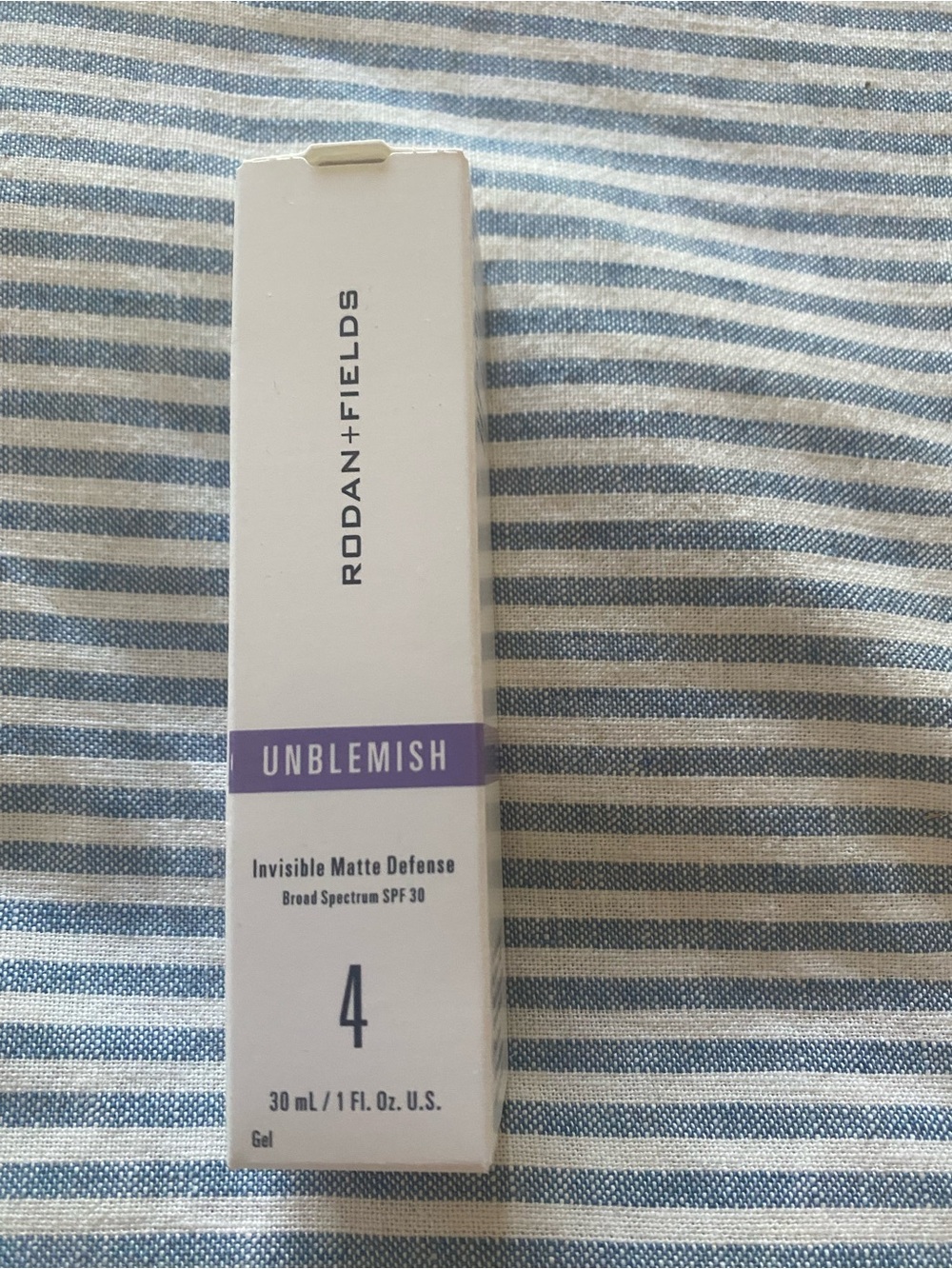 Rodan + Fields Unblemish Invisible Matte Defense SPF 30 - Shade 4